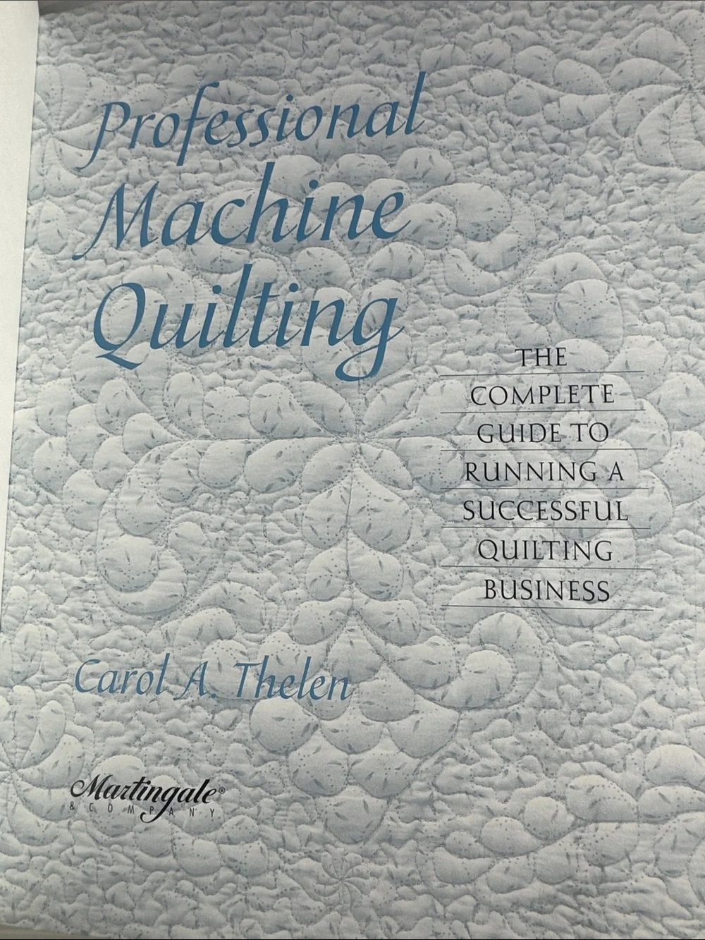 Professional Machine Quilting by Carol A. Thelen - Blue Cover